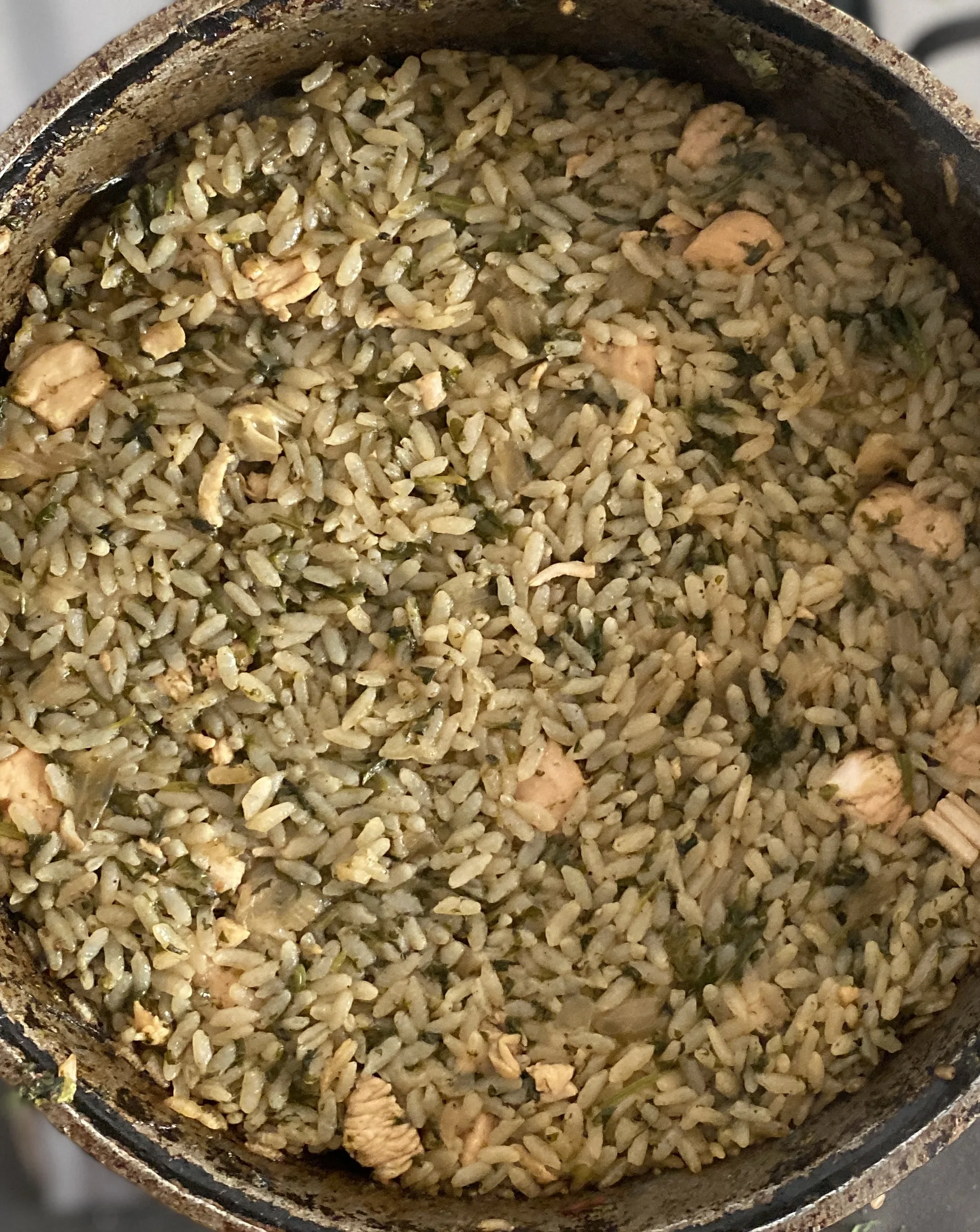A generous Mediterranean-style rice dinner with vegetables and herbs